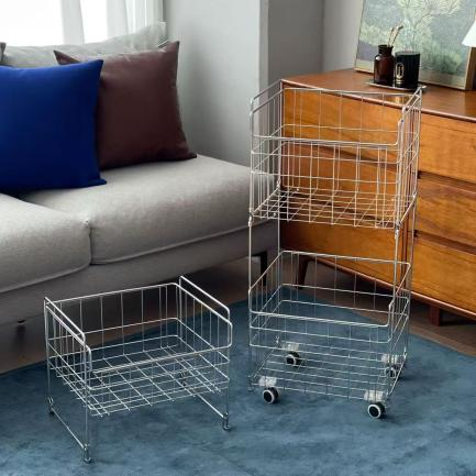 Un panier à linge coulissant à trois niveaux élégant et pratique